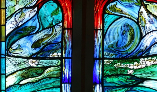 Four Seasons window by contemporary glass artist Jude Tarrant glass painter
